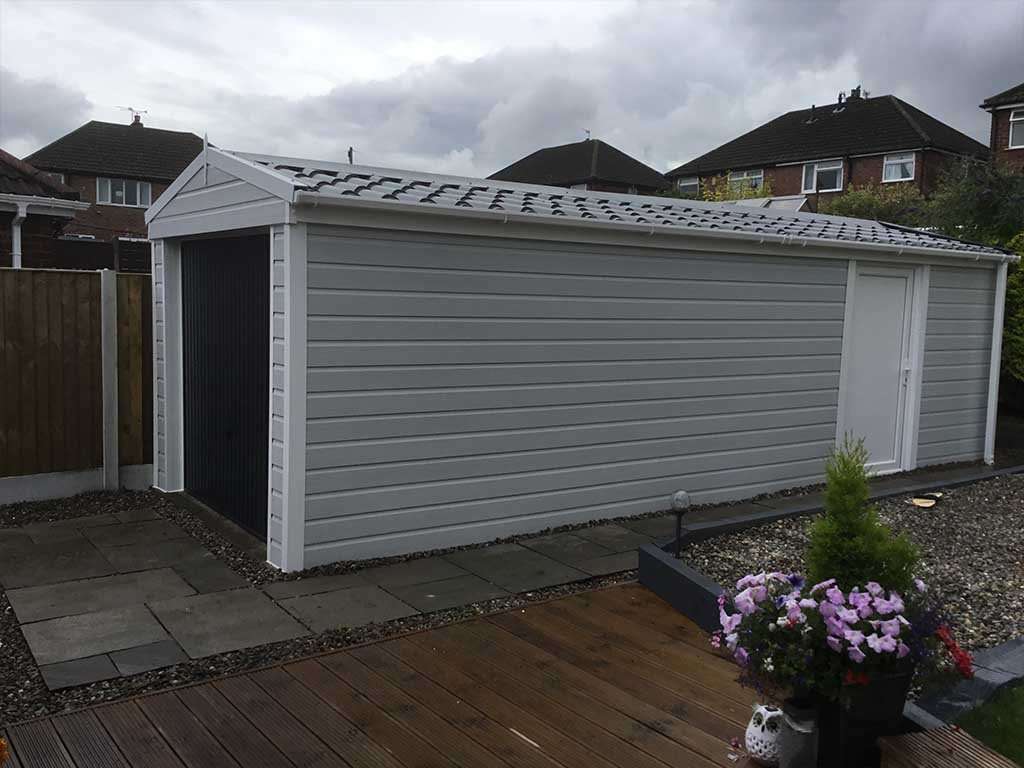 Long Garage Refurbishment in Grey Garage Cladding in Grey
