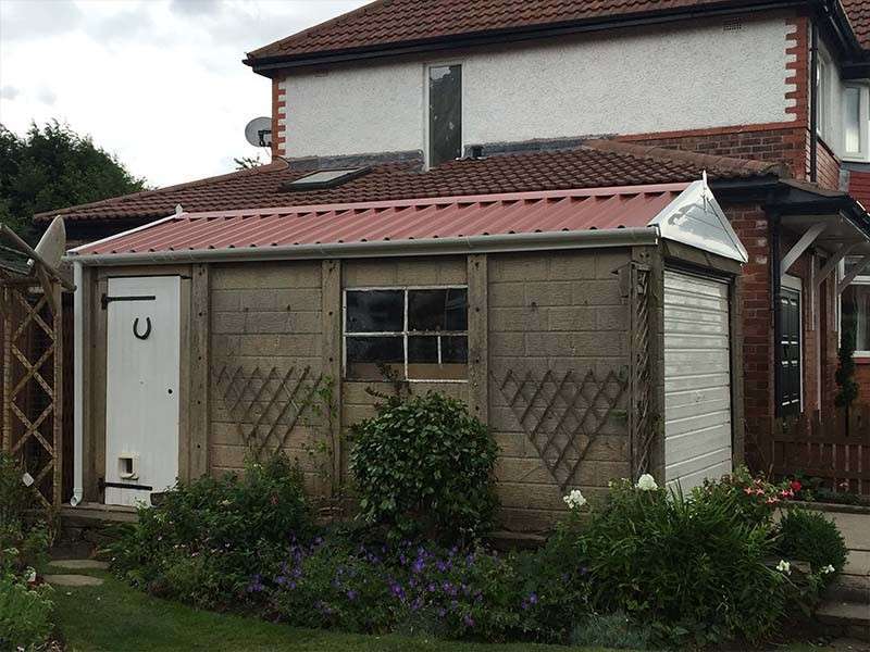 Concrete Sectional Garage with New Roof | Danmarque Garages