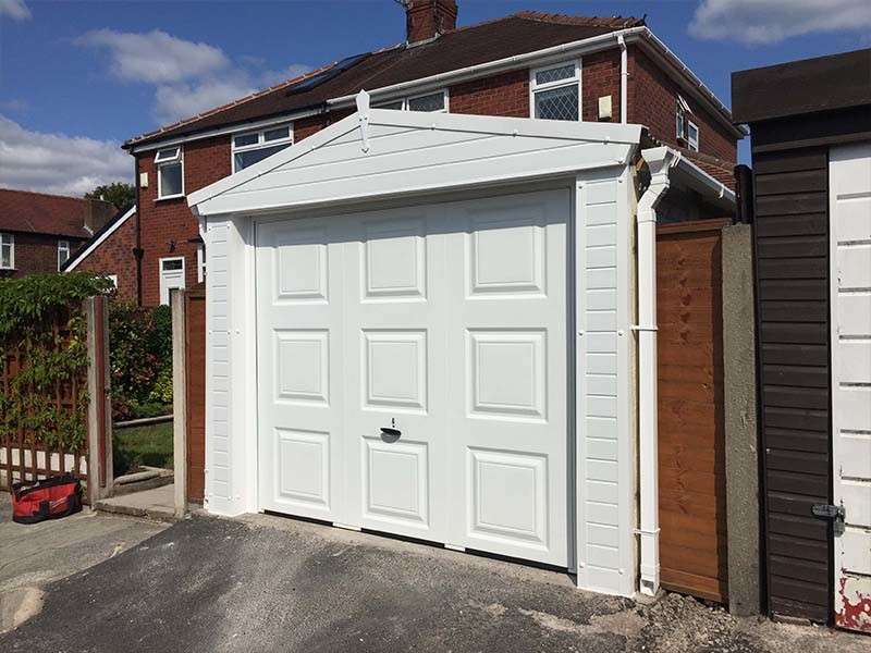 White Garage Cladding Around Garage Door | Danmarque Garages