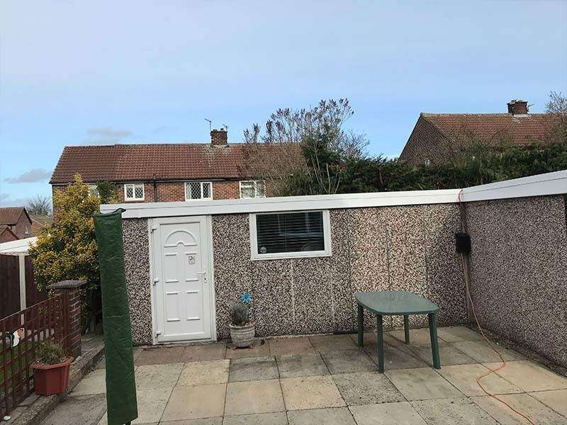 Large L shaped concrete garage | Danmarque Garages