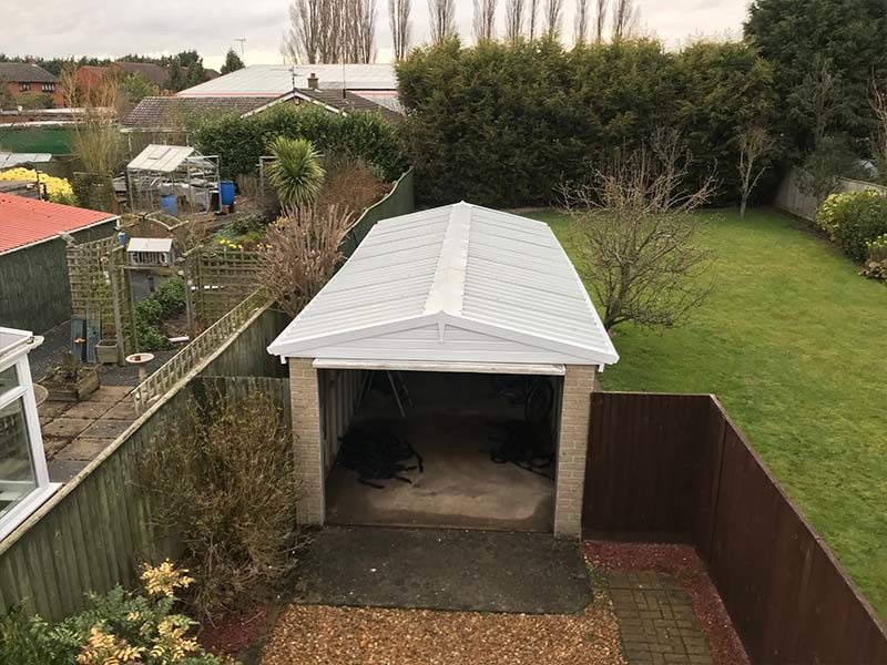 Single Concrete garage with a new roof | Danmarque Garages