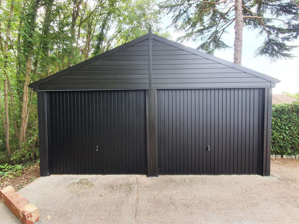 Double Garage Door replacement with Black Canopy Garage Doors | Danmarque Garages