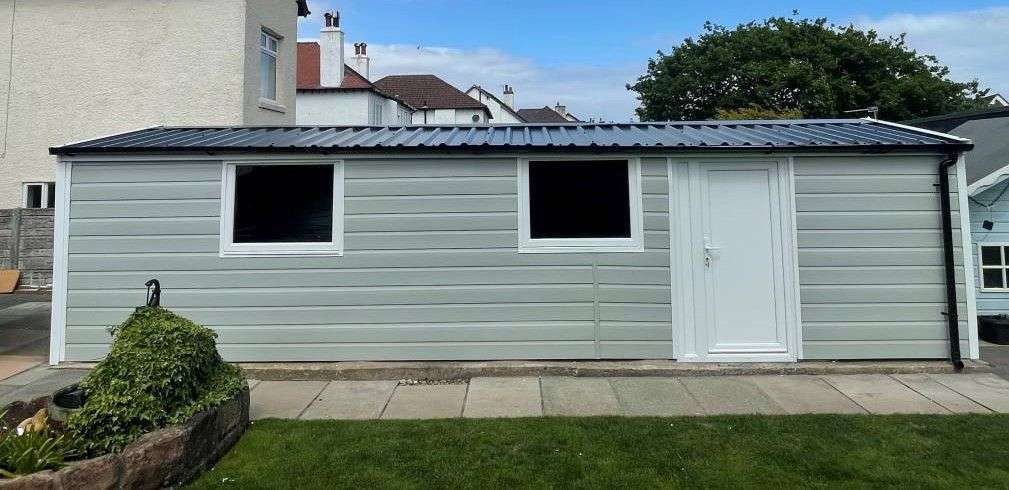 Garage Cladding Idea in UK Garden