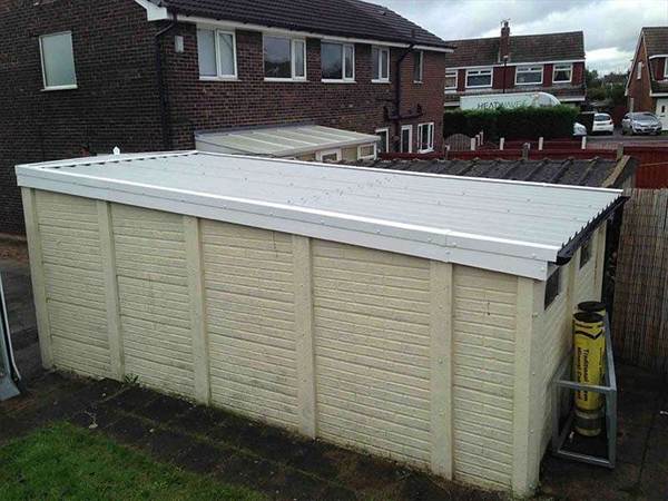 Asbestos Garage Roof Replacement Flat Roof Side View of a Single Garage with a New Flat Roof