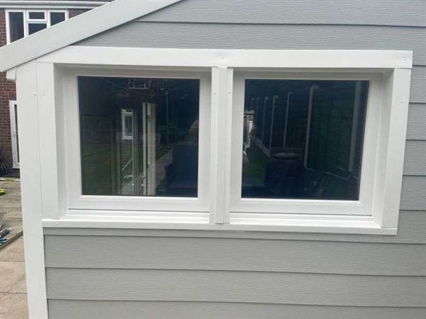 Cladded Garage With Window Installation Dual Garage Window installation into a Cladded Garage