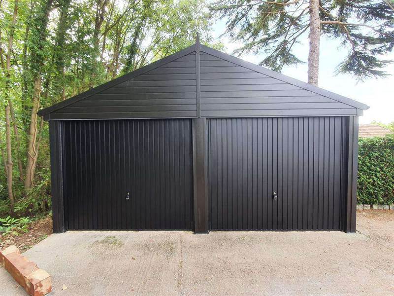 Two Black Garage Doors Installlation Double Garage with Two Brand New Garage Doors