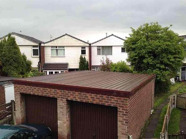 Double Garage Refurbished in Brown with Rosewood Finish Brick Garage with Vandyke Brown Garage Roof and Rosewood Fascia