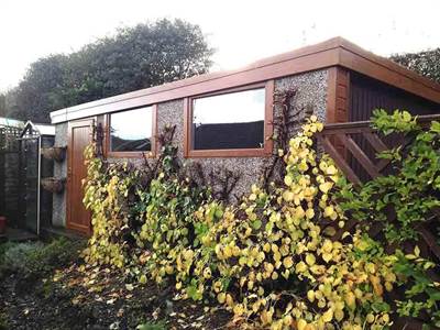 Light Oak Garage Refurbihsment After image Refurbished Garage with Brown Roof and Fascia
