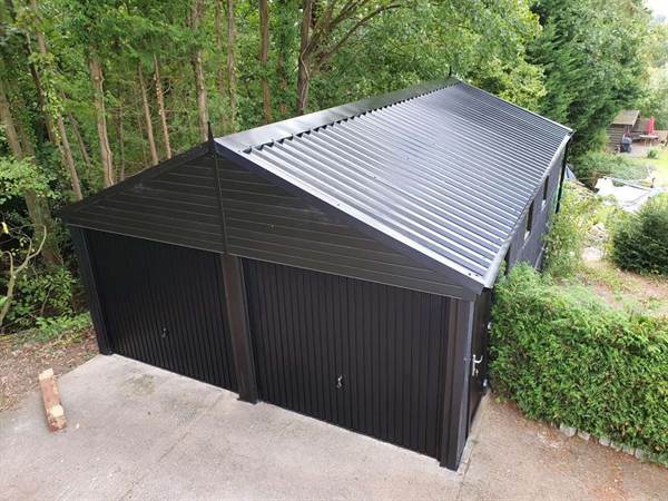 Double Garage Refurbishment With Black Roof Doors and Cladding Apex Double Garage Refurbished with Modern Black Materials
