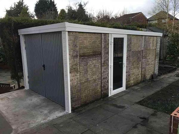 Pent Garage with New Garage Door and Full Side Door Garage Refurbishment of a Pent Garage with Grey Garage Door and Side Door