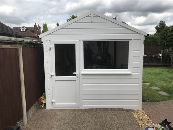 Garage Door Converted to Window and Side Door