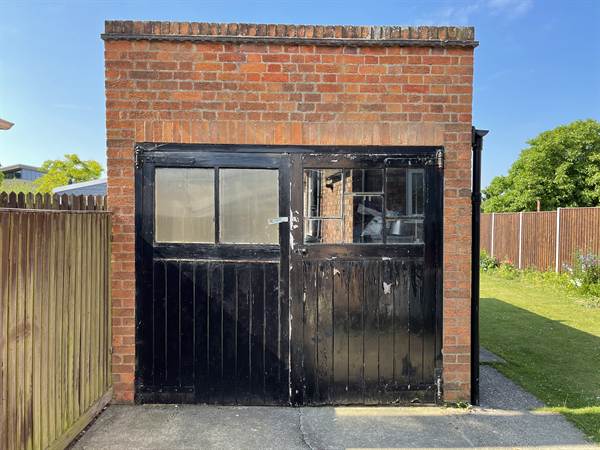 Old Garage in Conservation Area Old Brick Garage in Conservation Area