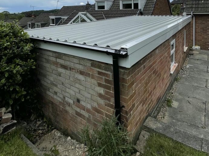 Garage Roof Replacement in Manchester Flat Garage Roof Replacement in Manchester